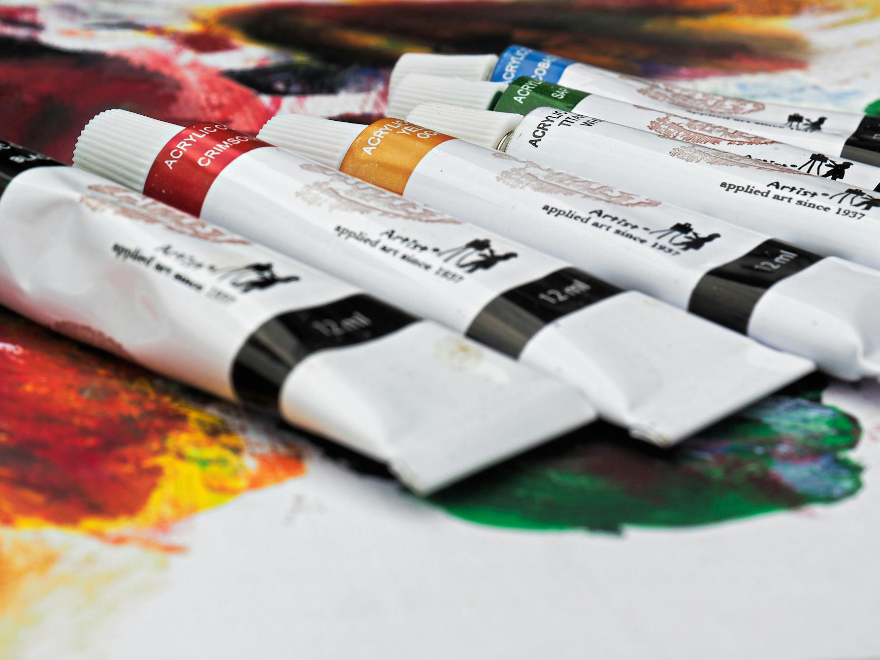 Acrylic paints and brushes arranged for painting